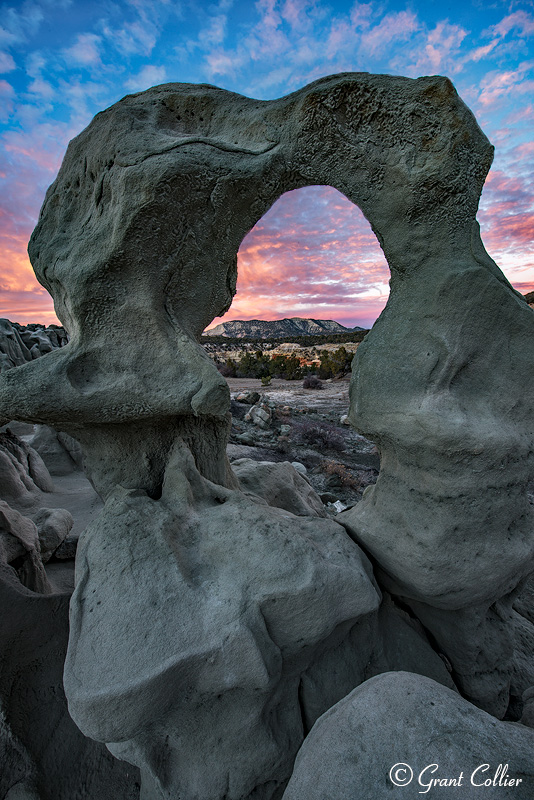 Sunset over Natural Arch in Colorado