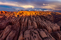 Dramatic clouds over the La Sal Mountains and Behind the Rocks