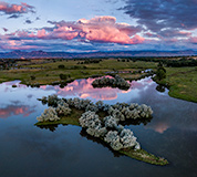 Sunrise over a pond near Boulder