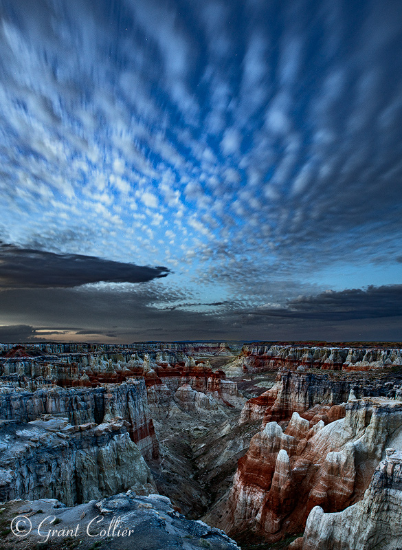 Stratus clouds over an Arizona canyon at twilight