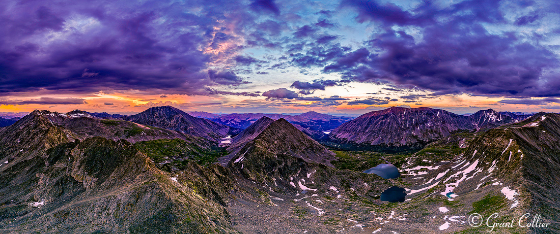 Peaks of the Tenmile Range and Wheeler Lake are seen from an aerial perspective in this wide panorama of Camp Hale - Continental Divide National Monument.