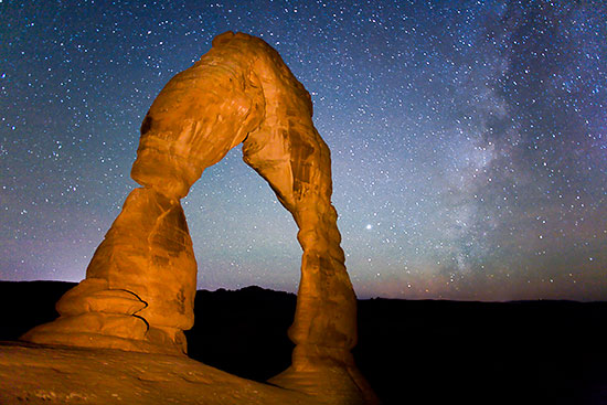 Delicate Arch light painting, stars, Milky Way, Utah