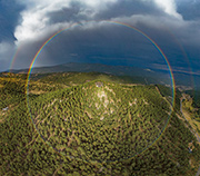 Full circle rainbow over Evergreen