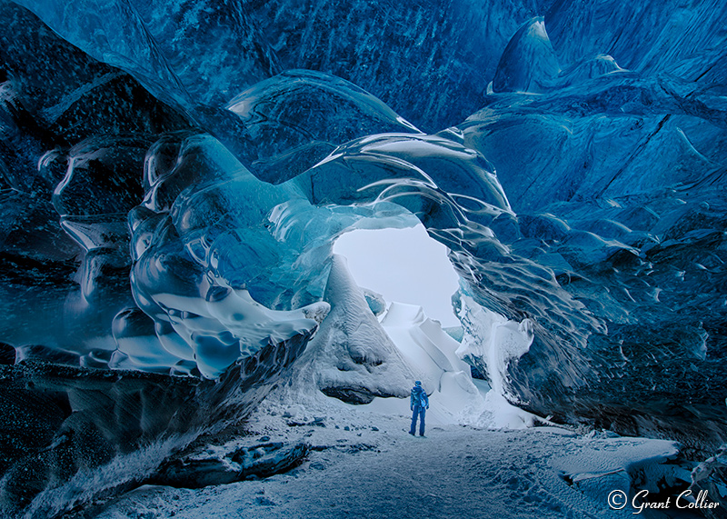 Person standing in Ice Cave, Iceland