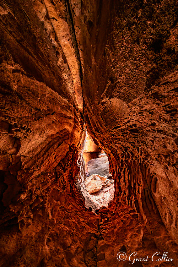 A remarkable rock cave lies just off the Joint Trail in the Needles District of Canyonlands National Park.