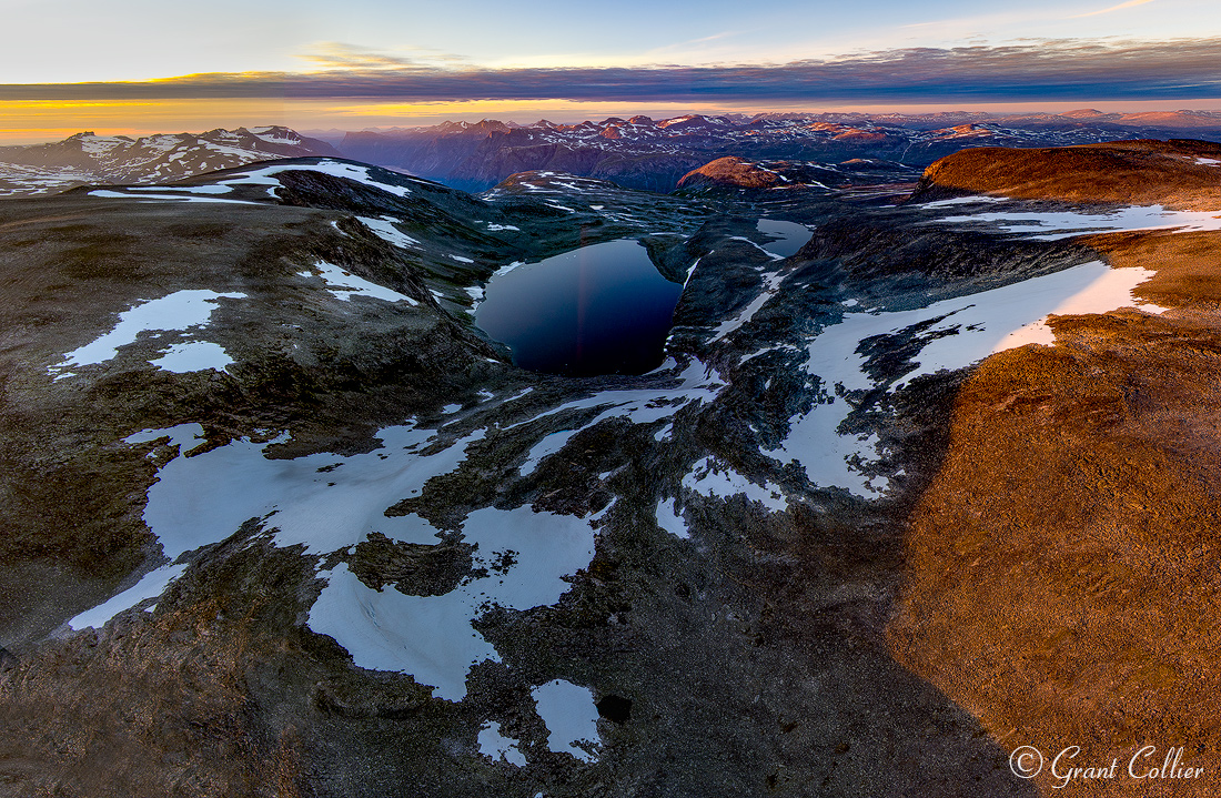 Bjorli Lake nestled above the mountains in Norway