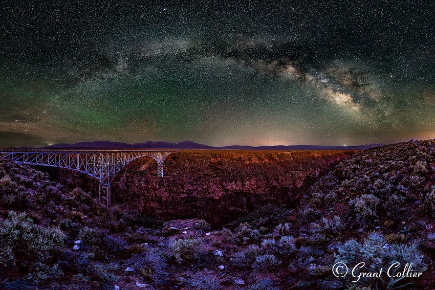 The full band of the Milky Way rises above the Rio Grande River Bridge.