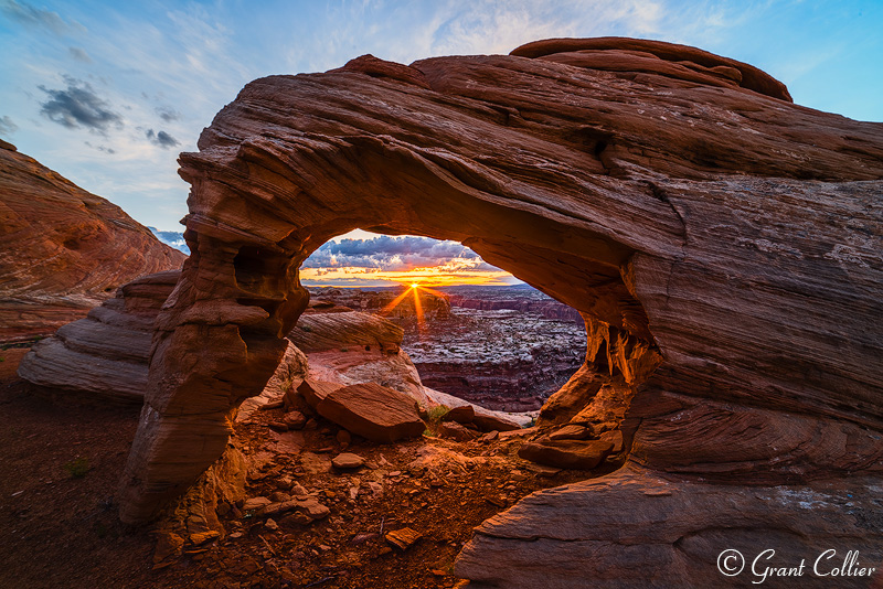 Sunrise behind Utah arch