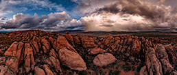 Dramatic clouds over sandstone fins in Behind the Rocks