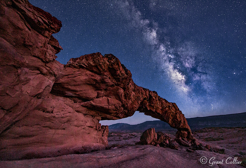 Milky over Sunset Arch in Escalante National Monument